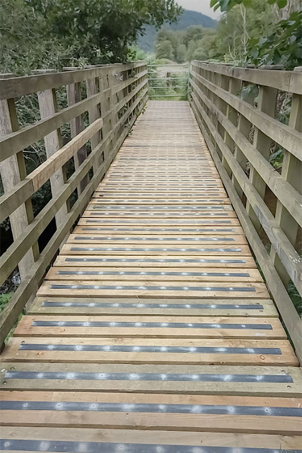 GRP stair nosing covers with anti-slip grit surface fitted to outdoor steps and ramp access