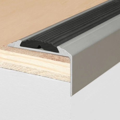 Square profile stair nosing fitted flush on a step edge
