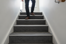 Heavy duty carpet stair nosing with Black insert — installed on UK carpeted staircase, anti-slip protection over carpet