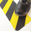 Black and yellow anti-slip stair tread 150x610mm — hazard stripe pattern