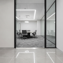Aluminium flat door threshold strip installed in modern UK office commercial floor transition