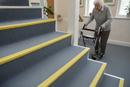 Heavy duty carpet stair nosing with Yellow insert — installed on UK carpeted staircase, anti-slip protection over carpet