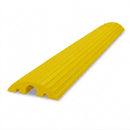 Yellow ribbed rubber cable protector with a large centre channel and two smaller outer channels visible at the open end, on a white background