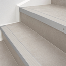66x55mm raked back aluminium stair nosing cut to size with a Light Grey castellated PVC insert