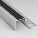 26mm aluminium tile-in stair nosing profile showing the recessed silicone carbide strip and perforated flange