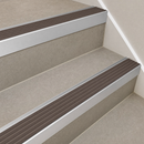 66x55mm raked back aluminium stair nosing cut to size with a Peat castellated PVC insert