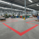 100mm red anti-slip tape as floor exclusion zone marking around factory machinery
