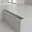 36mm slim anti-slip aluminium stair nosing on contemporary UK tiled apartment staircase - barely visible profile