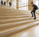 DDA anti-slip stair nosing with Beige PVC insert — installed on UK public building staircase, Part M compliant