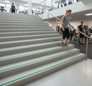 DDA anti-slip stair nosing with Green PVC insert — installed on UK public building staircase, Part M compliant
