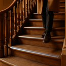 Silver aluminium step nosing fitted on period UK townhouse timber staircase - renovation protection