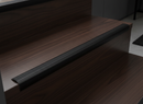 Black anodised aluminium stair nosing 1200mm installed on dark contemporary stairs