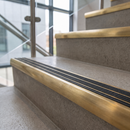 Ramped brass nosing with graphite grey grit insert
