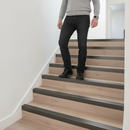 65mm heavy duty aluminium stair nosing with ribbed grip installed on UK laminate home staircase