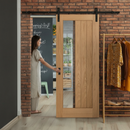 Premium Unfinished Oak Sliding Door with Clear Offset Glass - Classic Farley Design and Smooth Black Steel Track