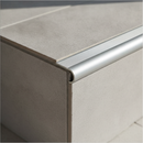 Close-up of tile-in aluminium stair nosing step edging 34mm x 11mm - flush with 10mm ceramic tile