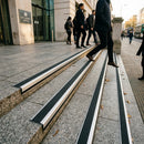 66x55mm aluminium stair nosing profile for high traffic indoor areas, showing metallic finish and L-shaped edge design