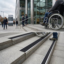 Black aluminum anti-slip stair nosing with textured surface, 10mm profile for heavy duty safety applications