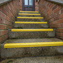 Yellow GRP stair nosing on outdoor external concrete steps — waterproof and UV-resistant