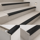 Profile view of heavy-duty stair nosing with wide 35mm black insert