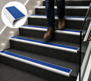 Carpet stair nosing with blue anti-slip rubber insert