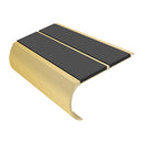 Aluminium bullnose anti-slip stair nosing with gold anodized finish and dark grey rubber inserts