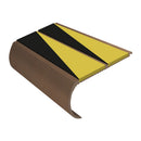 Heavy duty bullnose aluminium stair nosing with yellow and black hazard stripe anti-slip inserts