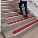 DDA compliant stair nosing with red colour contrast anti-slip insert