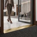 Brushed brass finish on 38mm ramp threshold profile for LVT and laminate