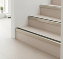 Champagne anodised aluminium stair nosing 1200mm on Scandinavian light ash stairs