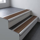 Mill aluminium bullnose stair nosing 66.5x30mm with Bronze Aluminium insert fitted on an office stair