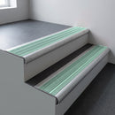 Mill aluminium bullnose stair nosing 66.5x30mm with Jade Castellated insert fitted on an office stair