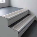 Mill aluminium bullnose stair nosing 66.5x30mm with Light Grey Smooth Textured insert fitted on an office stair
