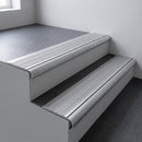 Mill aluminium bullnose stair nosing 66.5x30mm with Mill Aluminium insert fitted on an office stair
