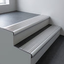 Aluminium bullnose stair nosing 66.5x30mm with Polished Aluminium insert fitted on an office stair