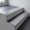 Mill aluminium bullnose stair nosing 66.5x30mm with Polished Aluminium insert fitted on an office stair