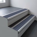 Mill aluminium bullnose stair nosing 66.5x30mm with Regency Castellated insert fitted on an office stair