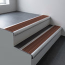 Mill aluminium bullnose stair nosing 66.5x30mm with Rustic Castellated insert fitted on an office stair