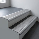 Aluminium bullnose stair nosing 66.5x30mm with Satin Aluminium insert fitted on an office stair