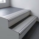 Mill aluminium bullnose stair nosing 66.5x30mm with Satin Aluminium insert fitted on an office stair