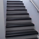 Black Anodised bullnose stair nosing 68x40mm with Black Anodised Aluminium insert, fitted to an interior stairwell