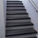 Black Anodised bullnose stair nosing 68x40mm with Black Castellated insert, fitted to an interior stairwell