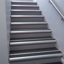 Mill Aluminium bullnose stair nosing 68x40mm with Black Olympic Grip insert, fitted to an interior stairwell
