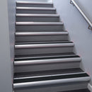 Mill Aluminium bullnose stair nosing 68x40mm with Black Smooth Textured insert, fitted to an interior stairwell