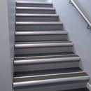 Mill Aluminium bullnose stair nosing 68x40mm with Granite Castellated insert, fitted to an interior stairwell