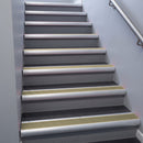 Mill Aluminium bullnose stair nosing 68x40mm with Light Bronze Aluminium insert, fitted to an interior stairwell