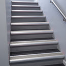 Mill Aluminium bullnose stair nosing 68x40mm with Light Grey Smooth Textured insert, fitted to an interior stairwell