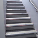 Polished Aluminium bullnose stair nosing 68x40mm with Cloud Castellated insert, fitted to an interior stairwell