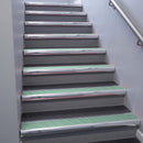 Polished Aluminium bullnose stair nosing 68x40mm with Jade Castellated insert, fitted to an interior stairwell