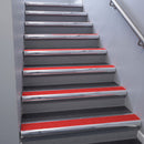 Polished Aluminium bullnose stair nosing 68x40mm with Poppy Castellated insert, fitted to an interior stairwell